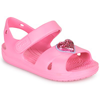 Schoenen Meisjes Sandalen / Open schoenen Crocs CLASSICCROSSSTRAPCHARMSANDAL T Roze
